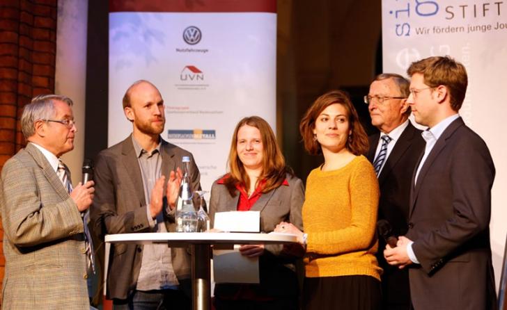 Stipendiaten auf dem Podium